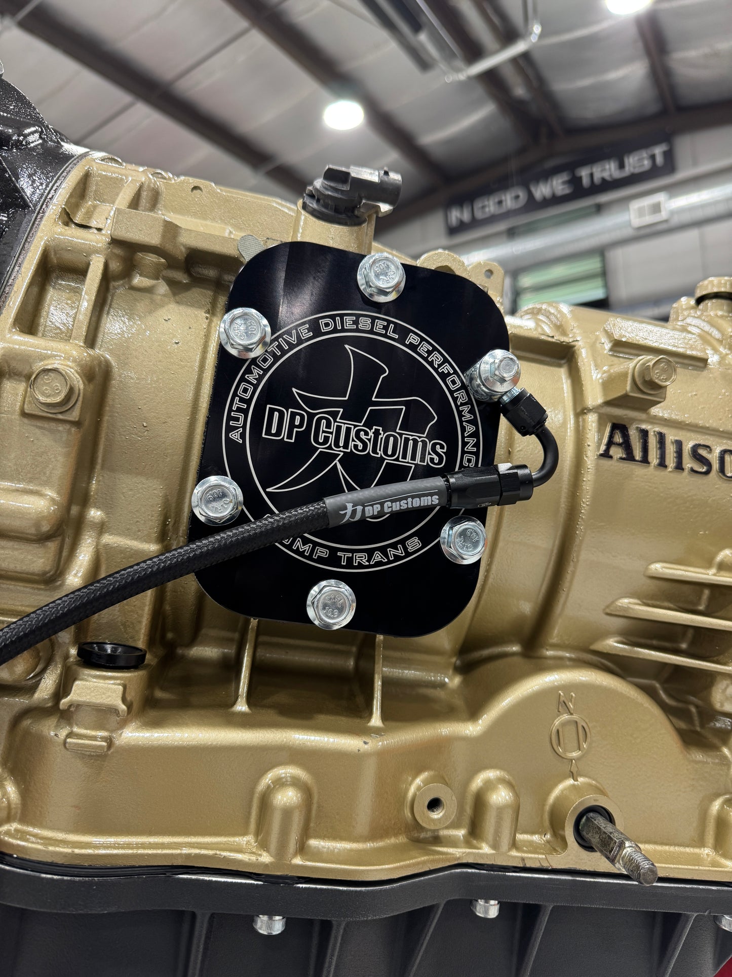 DP Customs Allison 1000 C3 Snake Oiler installed on a vehicle, showing the compact, durable oiling system for transmission maintenance.