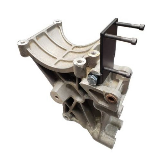 DP Customs SoCal Diesel waterpump bypass bracket mounted on engine, showcasing durable metal construction for diesel truck cooling systems.