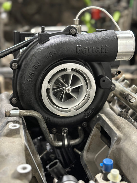 JZM 63.5mm LLY-LML VGT turbocharger upgrade by JZ Manufacturing, showing the new turbine and compressor housing assembly.