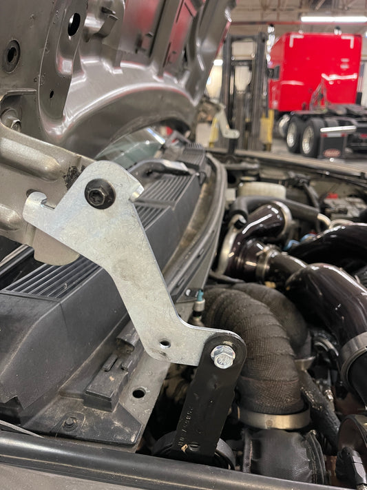 DP Customs high access hood brackets for 2007.5-2016 GM trucks, showing durable metal construction and easy installation features.