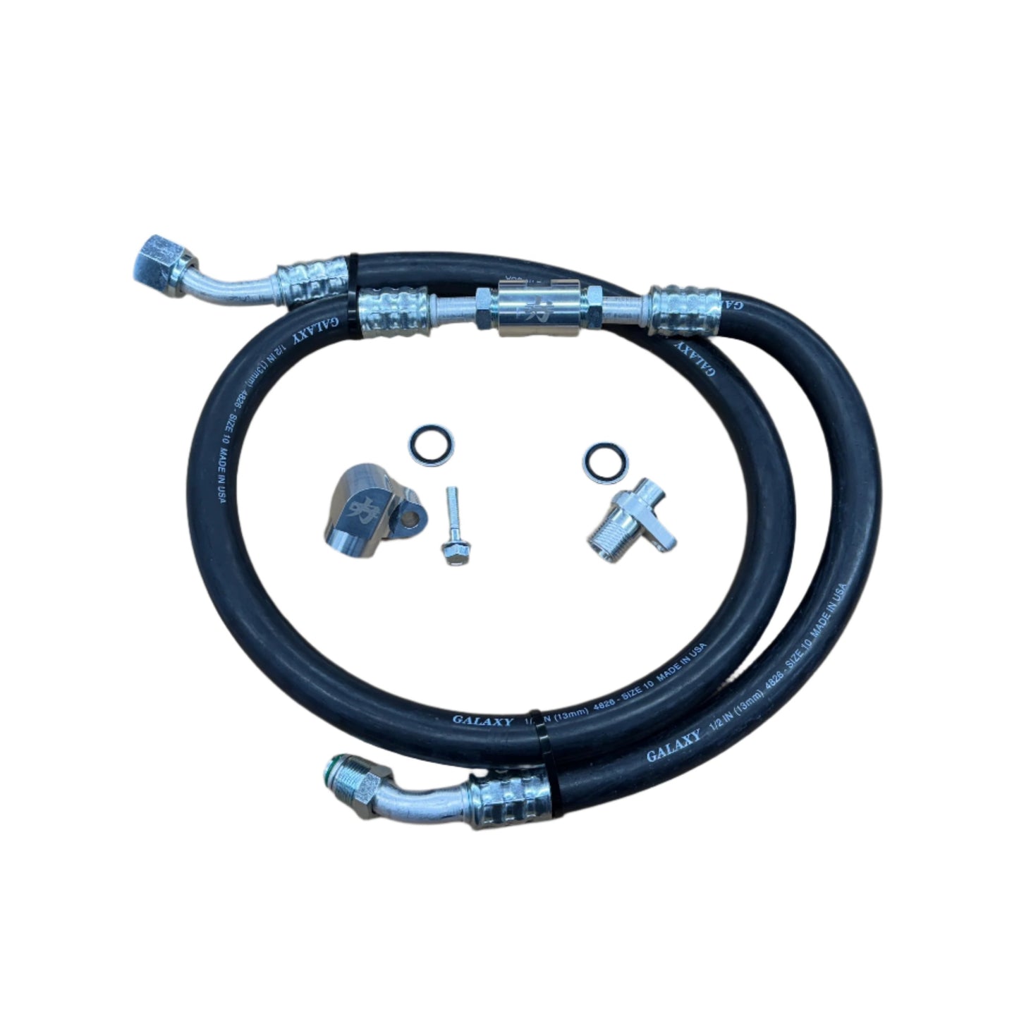 DP Customs 03-07 Duramax front route AC suction line showing metal tubing and fittings for vehicle air conditioning system.