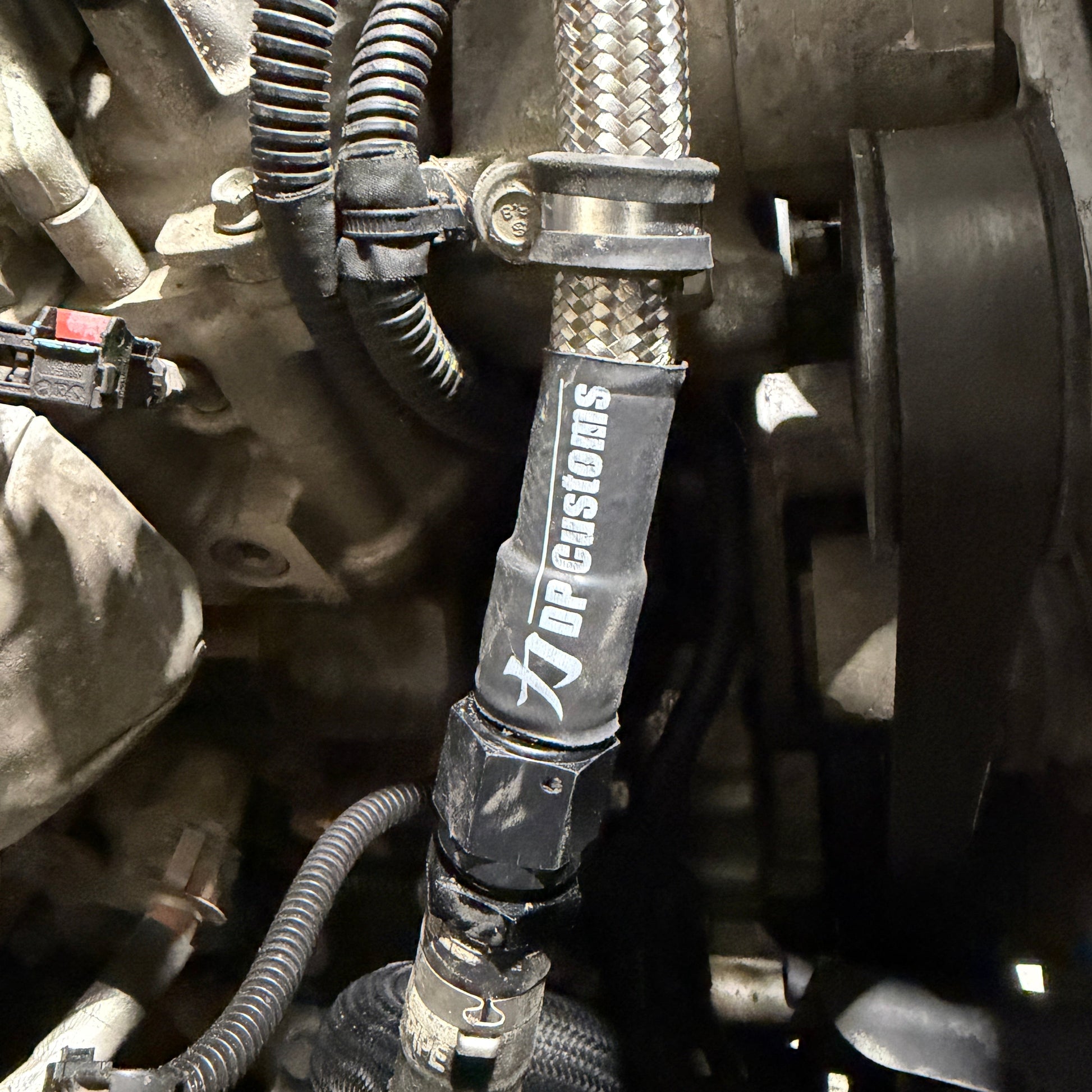 DP Customs -10AN L5P Duramax coolant heater hose kit with hoses and fittings for Duramax diesel engines.