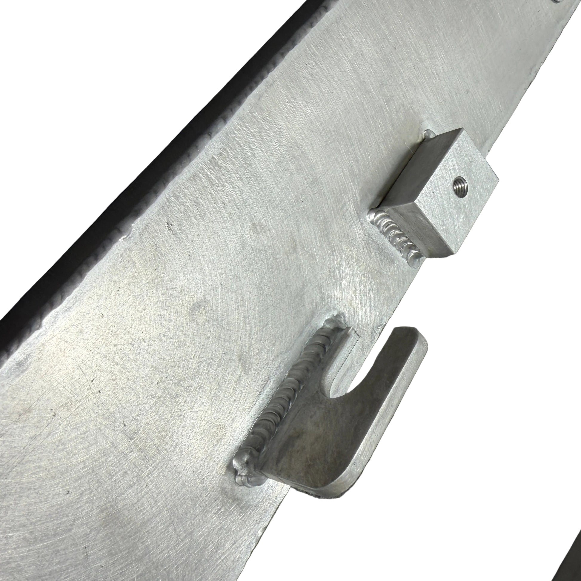 DP Customs 2001-2007 Duramax radiator supports shown, made of durable metal for engine cooling system replacement.