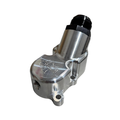 DP Customs 2001-2010 Duramax ForwardFlow Billet Thermostat Housing, shiny aluminum with mounting bolts and inlet/outlet ports.