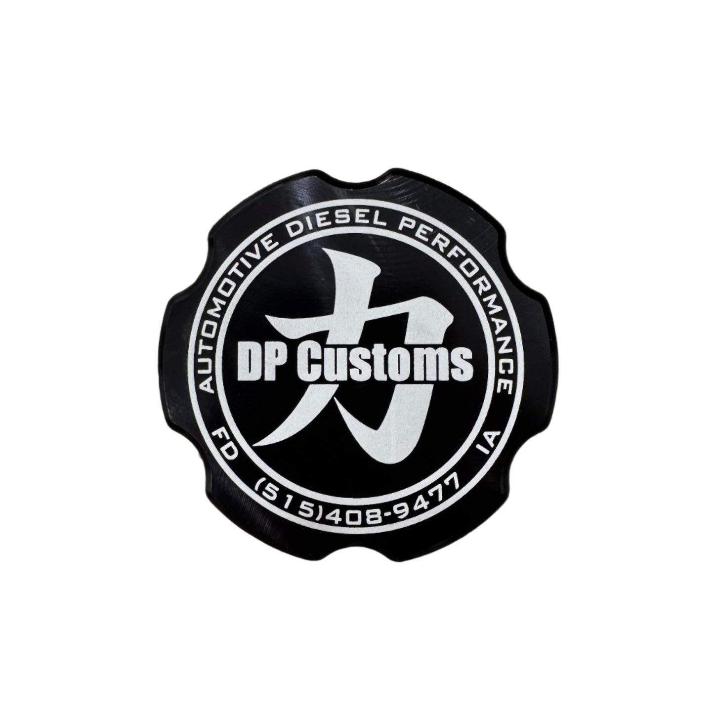 DP Customs billet oil cap cover for 2001-2026 Duramax LB7, LLY, LBZ, LMM, LML, L5P engine, shown on engine component.