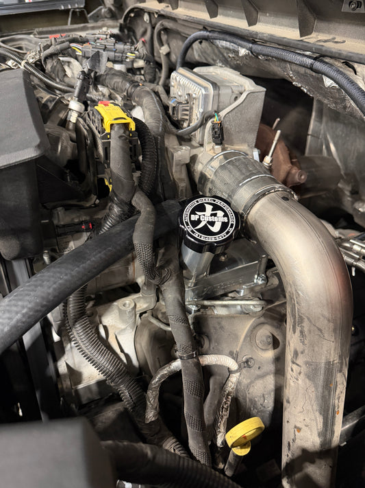 DP Customs 2017-2026 Duramax L5P billet CCV system installed, showcasing durable aluminum construction and precise fitting details.