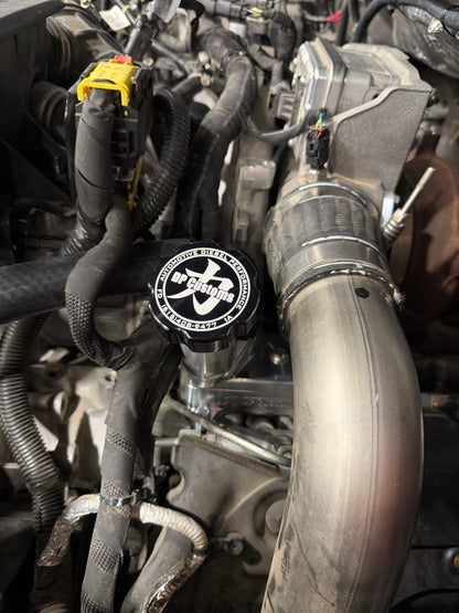 DP Customs 2017-2026 Duramax L5P billet CCV system showing polished metal components and hoses for diesel engine performance.