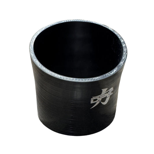 DP Customs 5-inch 22-degree intake boot, black rubber automotive intake component with molded contours and branding details.