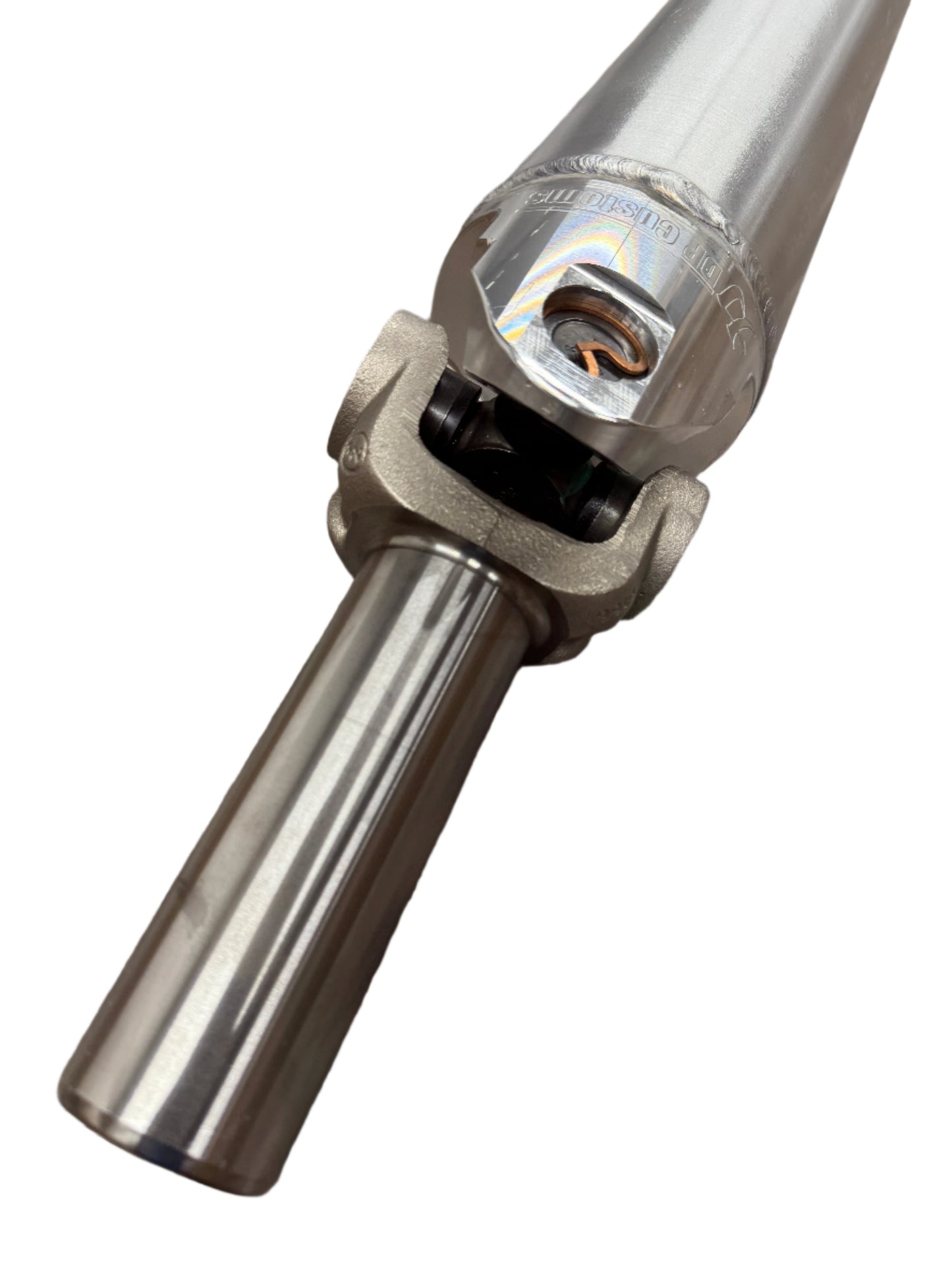 DP Customs 5-inch billet yoke driveshaft for automotive applications, showing the polished metal yoke with precise machining details.