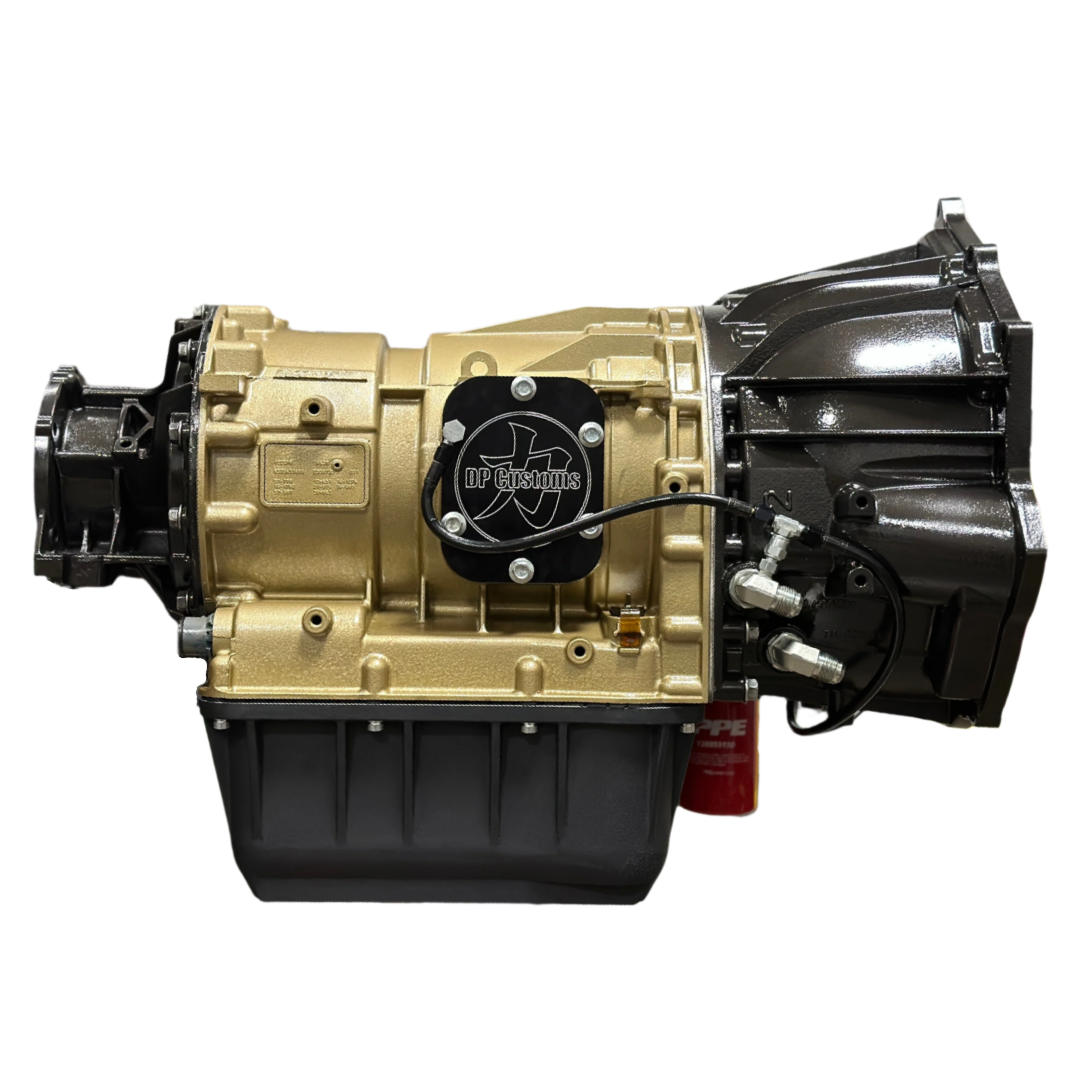 DP Customs Allison 1000+hp Competition Transmission showing detailed metal casing and gear components.