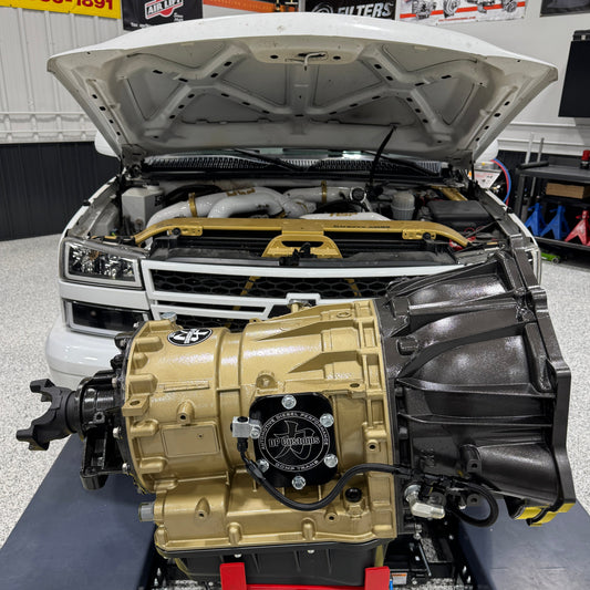 DP Customs Allison 1000+hp competition transmission showing detailed metallic components and robust construction.