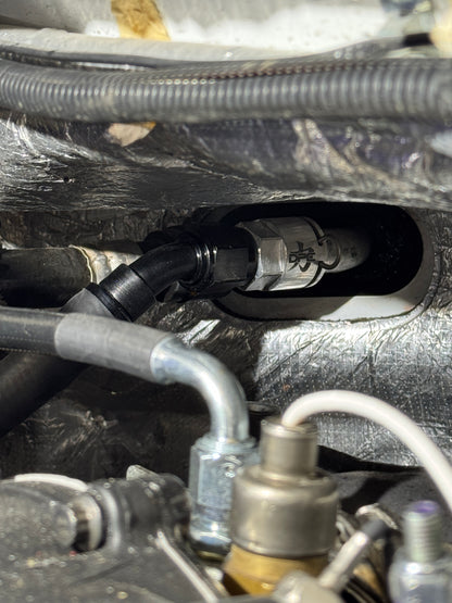 DP Customs billet -10 AN GM heater core adapter fitting shown, made of durable billet aluminum for automotive cooling system connection.