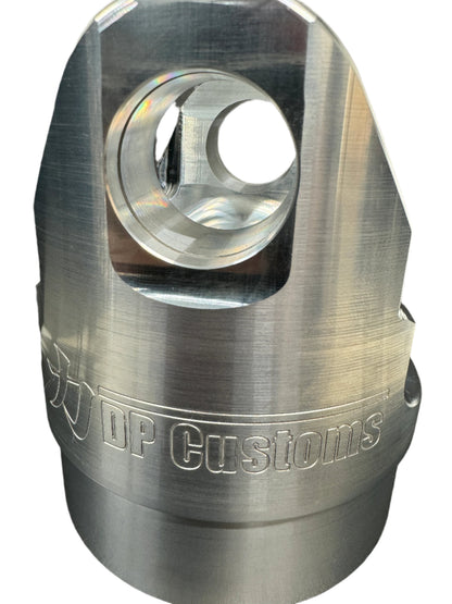 DP Customs billet aluminum driveshaft yoke for 1480 U-joint, shown in close-up detail with polished finish and precise machining.