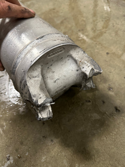 DP Customs billet aluminum driveshaft yoke for 1480 U-joint, shown in close-up with polished finish and detailed machining.