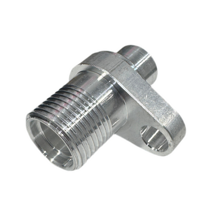 DP Customs billet AC accumulator fitting adapter, close-up view showing sleek metal finish and precise threading for automotive use