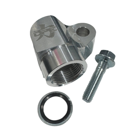 DP Customs billet AC compressor adapter showing polished metal finish and detailed machining for automotive AC systems.