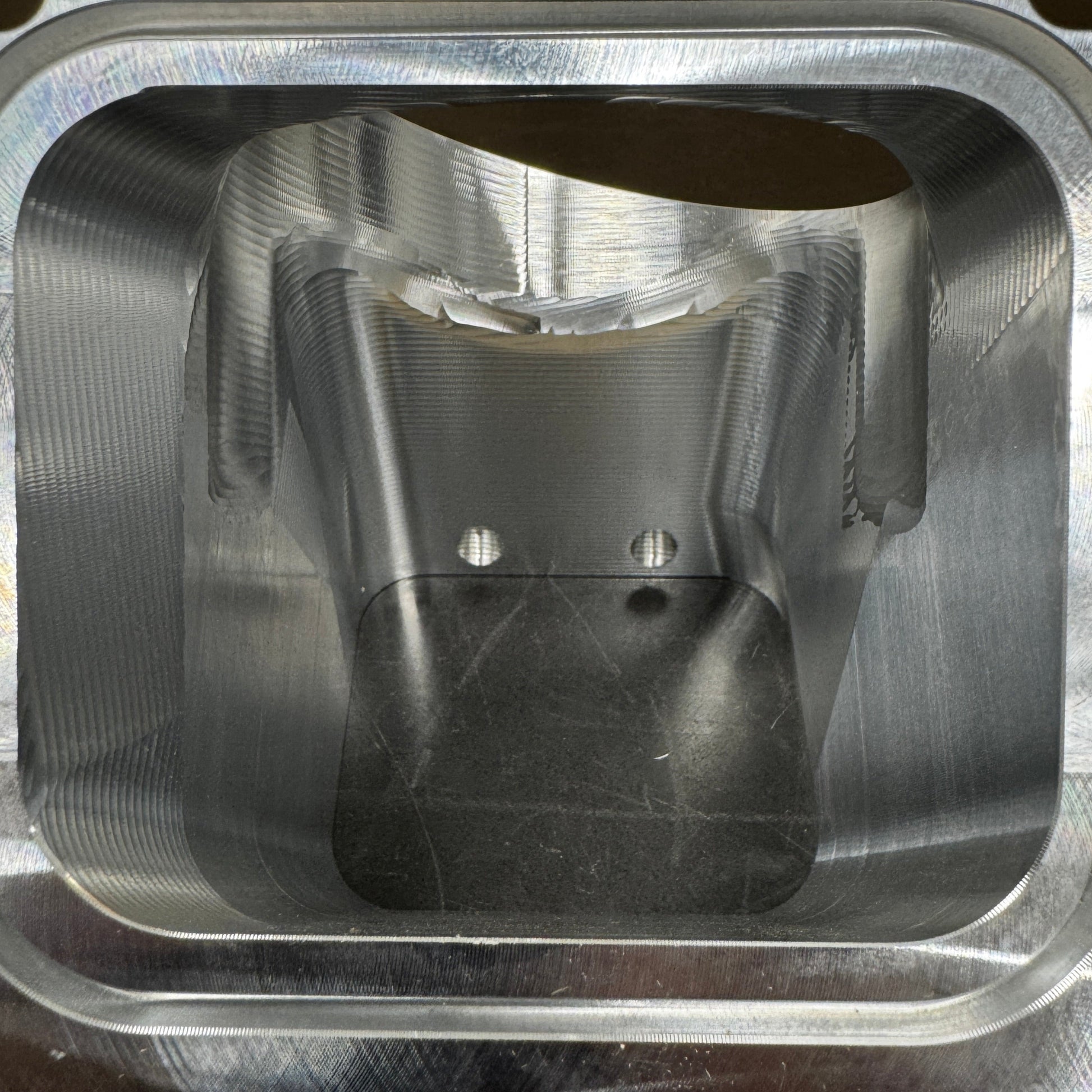 DP Customs Duramax 3.5-inch billet Y bridge showing polished aluminum construction and precise machining details.