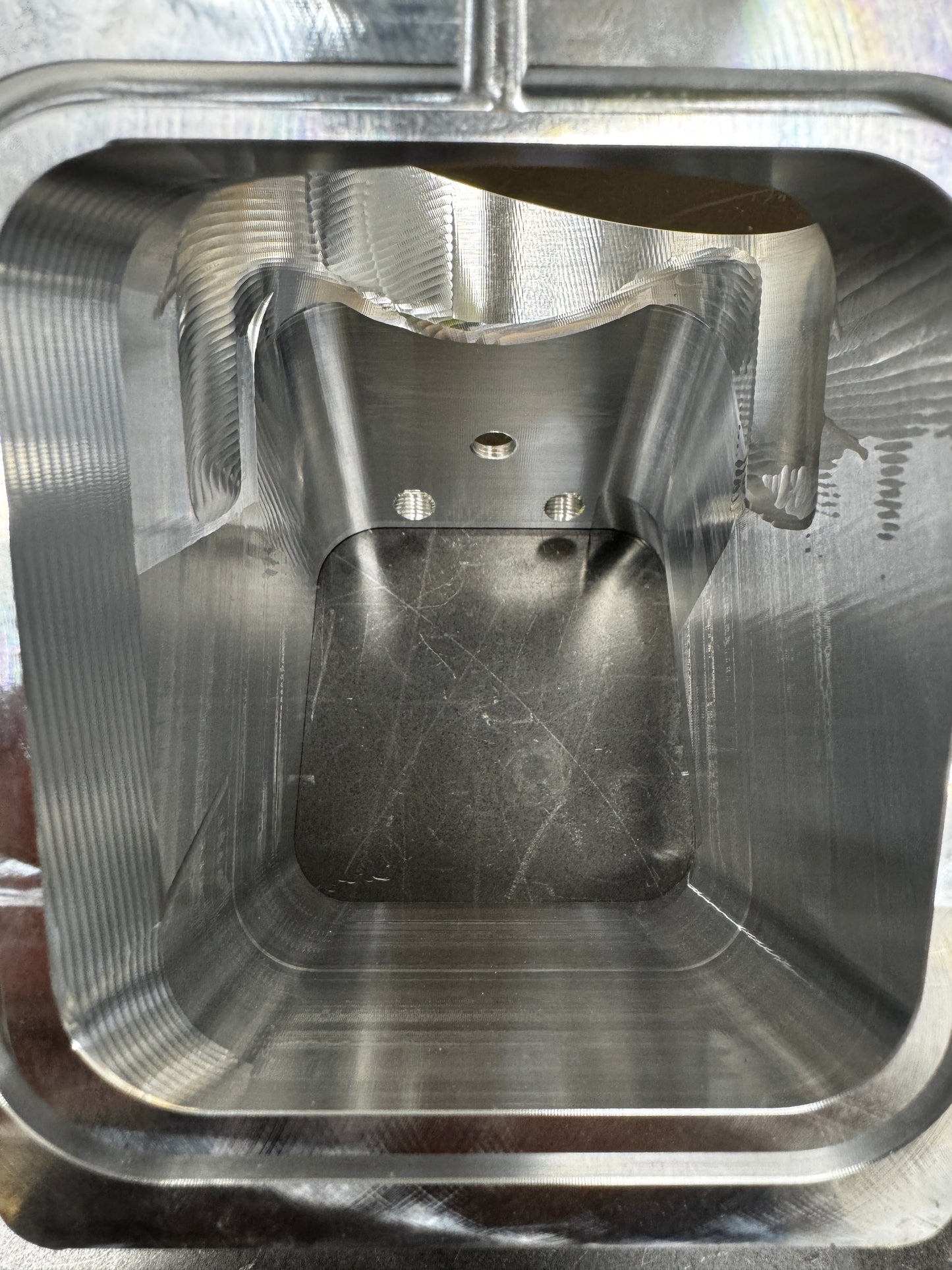 DP Customs Duramax 3.5-inch billet Y bridge, high-quality aluminum engine part for Duramax diesel trucks, shown in close-up.
