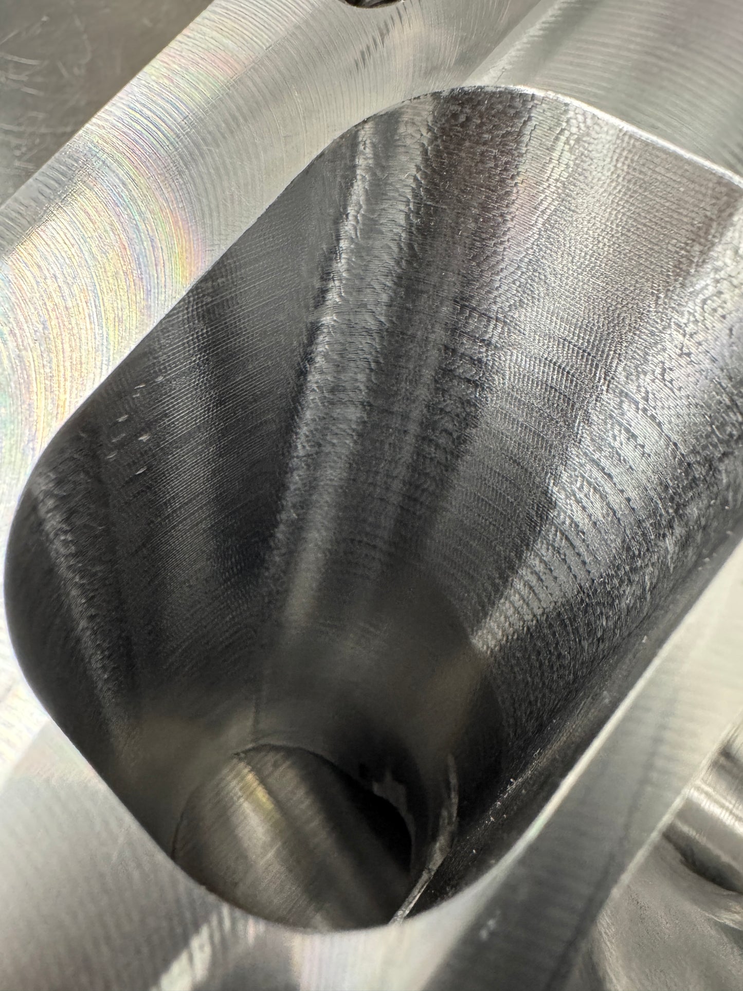 DP Customs Duramax billet T6 wastegate pedestal with detailed machining and mounting hardware for diesel turbochargers.
