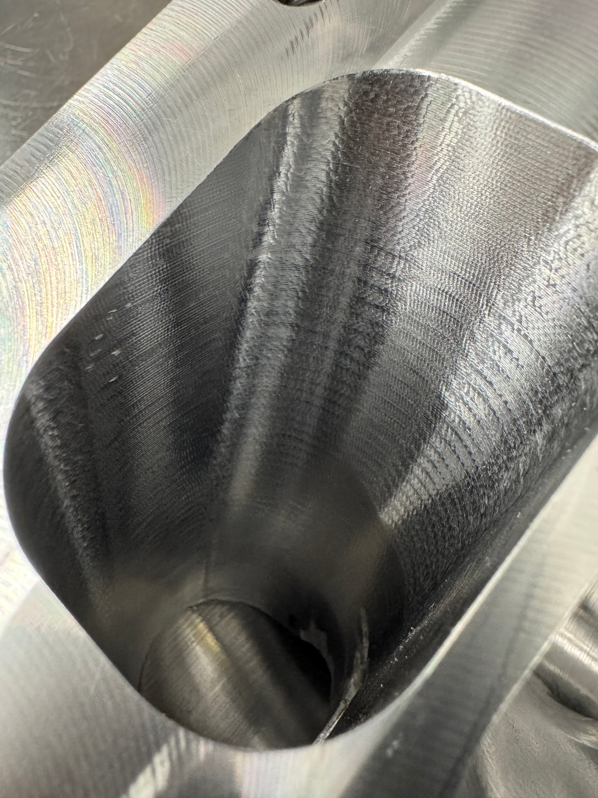 DP Customs Duramax billet T6 wastegate pedestal with detailed machining and mounting hardware for diesel turbochargers.