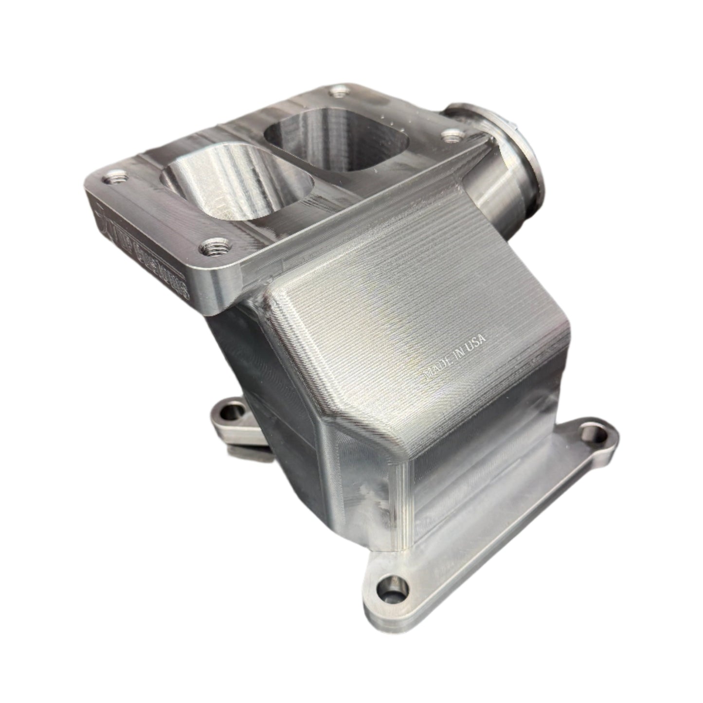DP Customs Duramax billet T6 wastegate pedestal mounted on engine, showcasing precision-machined aluminum construction.