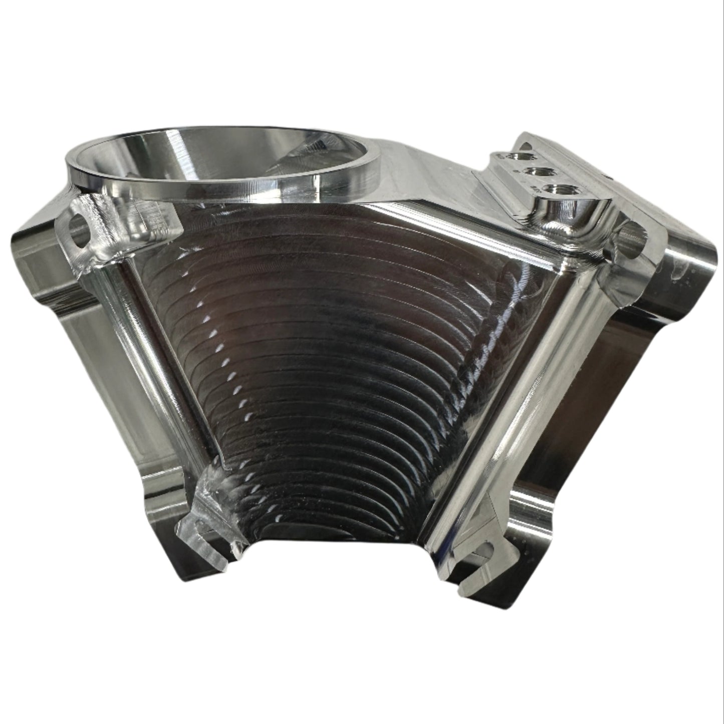 DP Customs Duramax billet Y bridge showing a polished aluminum Y-shaped automotive engine component with intricate machining details.