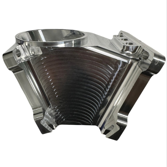 DP Customs Duramax billet Y bridge showing a polished aluminum Y-shaped automotive engine component with intricate machining details.