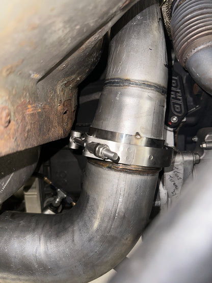 DP Customs Duramax S400 Downpipe installed on a vehicle, showcasing the durable stainless steel construction and precise fit.