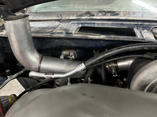 DP Customs Duramax S400 Hoodstack exhaust system installed on a diesel truck, showcasing the chrome finish and custom-fit design.