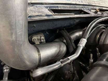 DP Customs Duramax S400 Hoodstack installed on a truck, showcasing the custom exhaust stack with polished metal finish.
