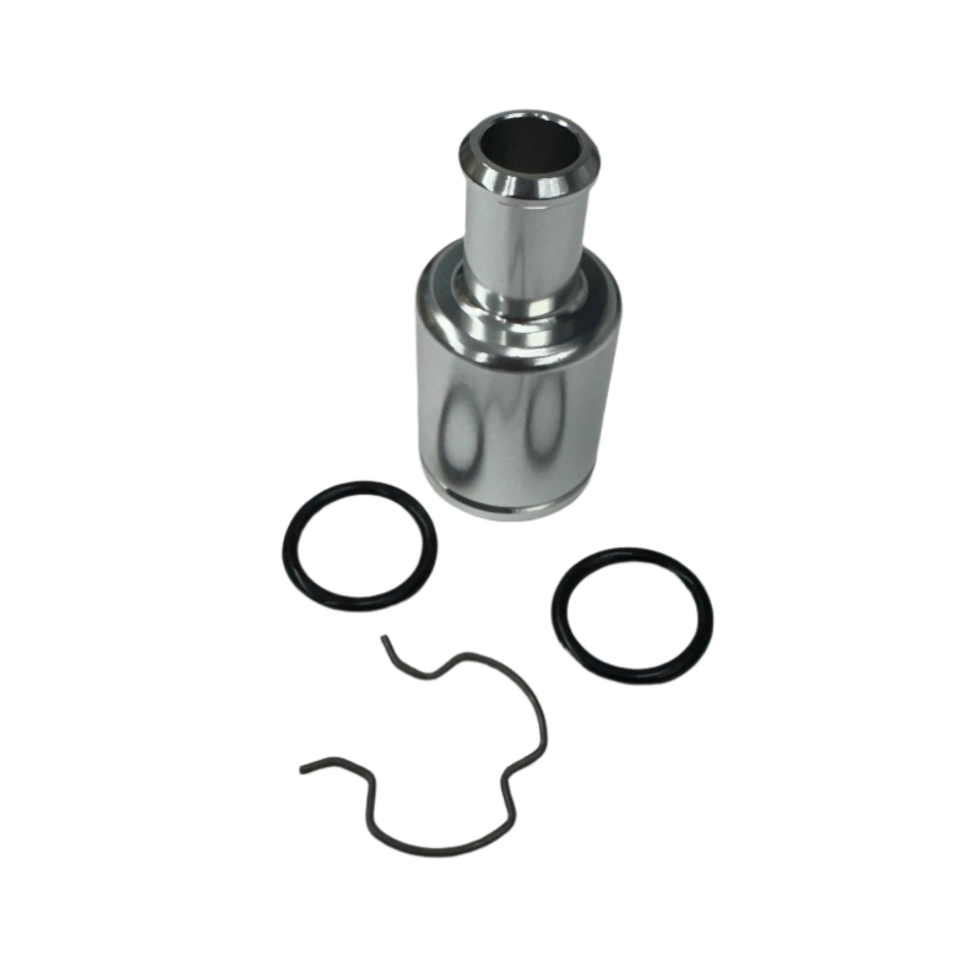 DP Customs GM 3/4 heater core fitting, metal automotive component with inlet and outlet ports for vehicle cooling system.