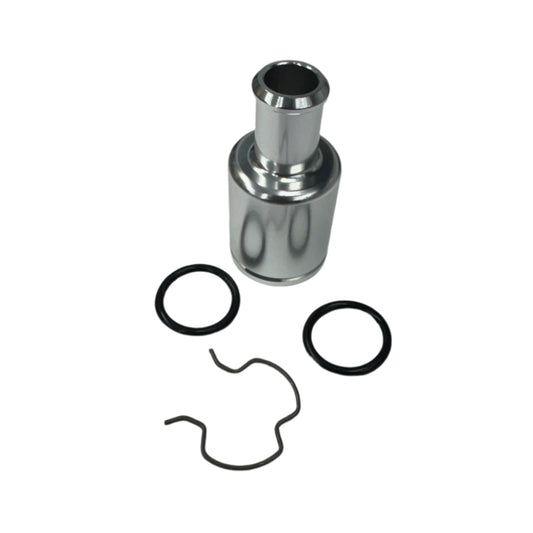 DP Customs GM 3/4 heater core fitting, metal automotive component with inlet and outlet ports for vehicle cooling system.