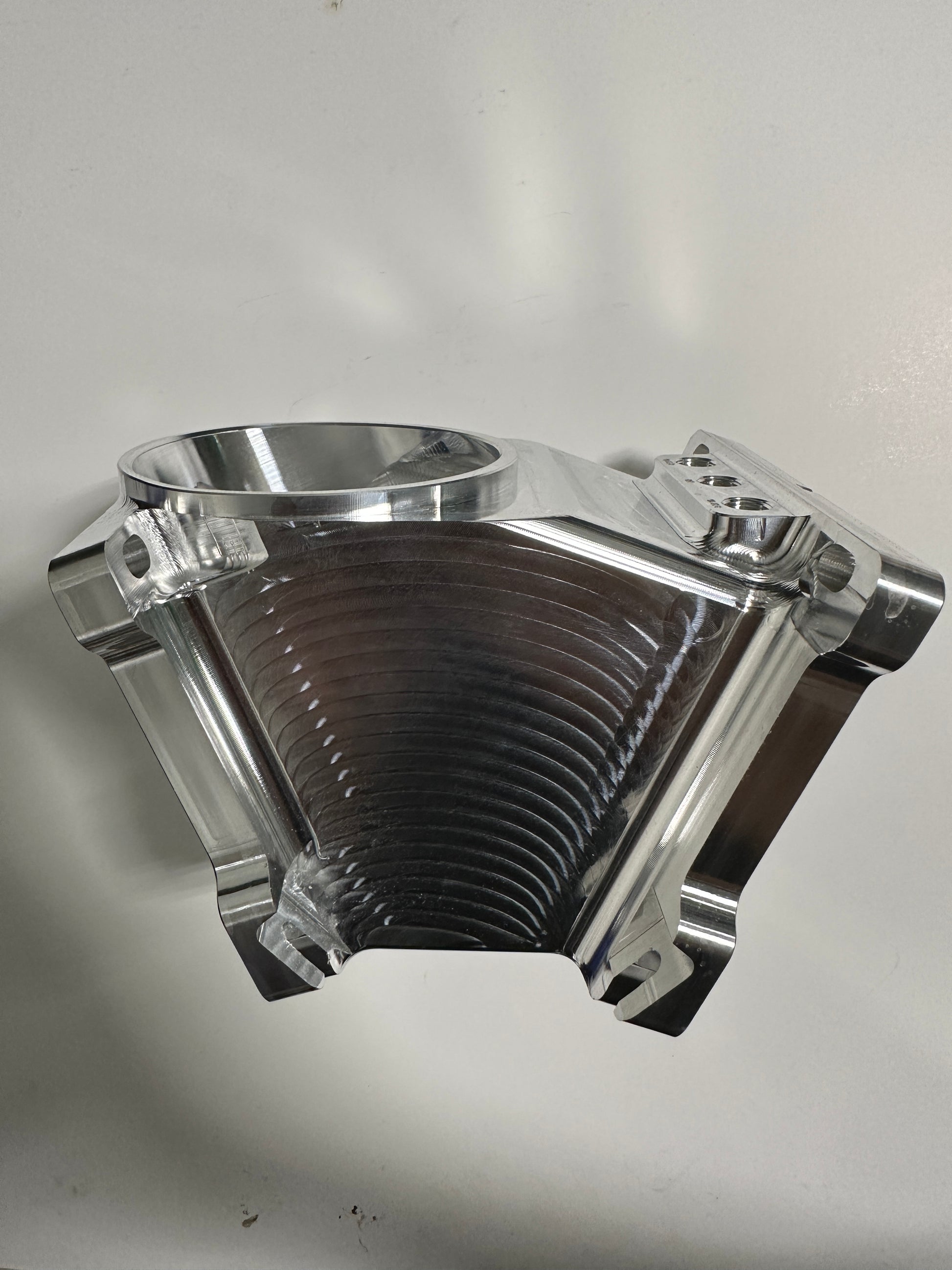 DPC Duramax S400 Coldside Assembly by DP Customs, showing the metal turbocharger component with piping and fittings.