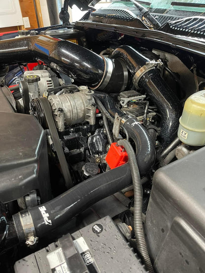 DPC LB7 Duramax S400 single turbo kit from DP Customs, showing the turbocharger and piping components in the image.