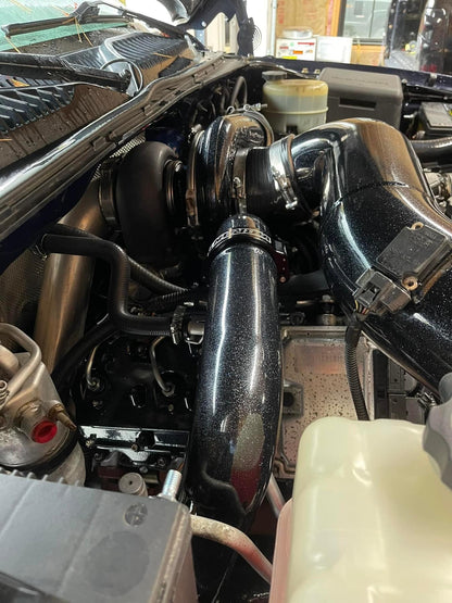 DP Customs DPC LB7 Duramax S400 single turbo kit with turbocharger and piping, ready for installation on diesel engine.