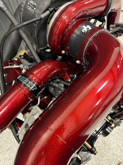 DP Customs DPC LB7 Duramax S400 single turbo kit installed on diesel engine with visible components and piping