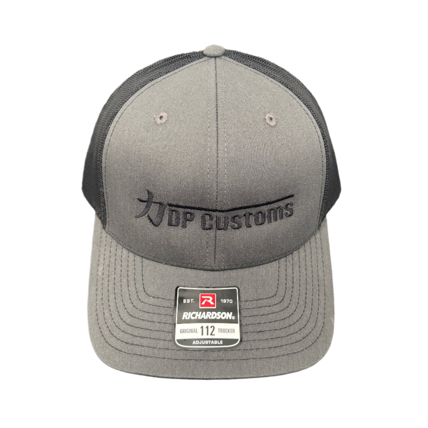 Black DPC Trucker Hat by DP Customs with mesh back and curved brim, featuring the brand logo on front panel.