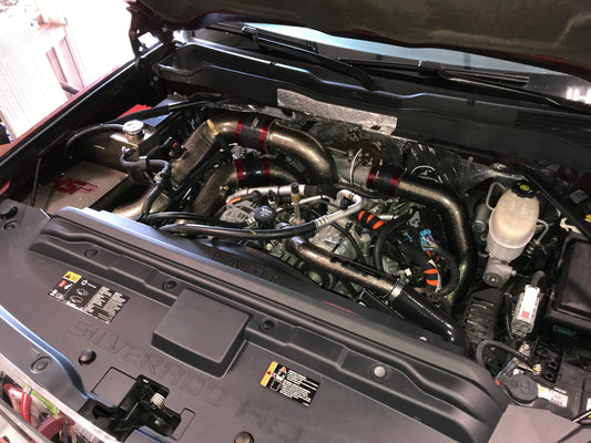 DP Customs HSP LML Duramax Intercooler Pipe Kit installed on a truck, showcasing durable intercooler piping system.
