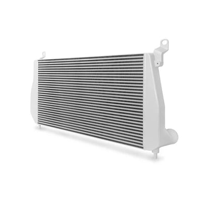 Mishimoto intercooler for 2001-2005 Duramax diesel engine, featuring core and end tanks, installed in engine bay