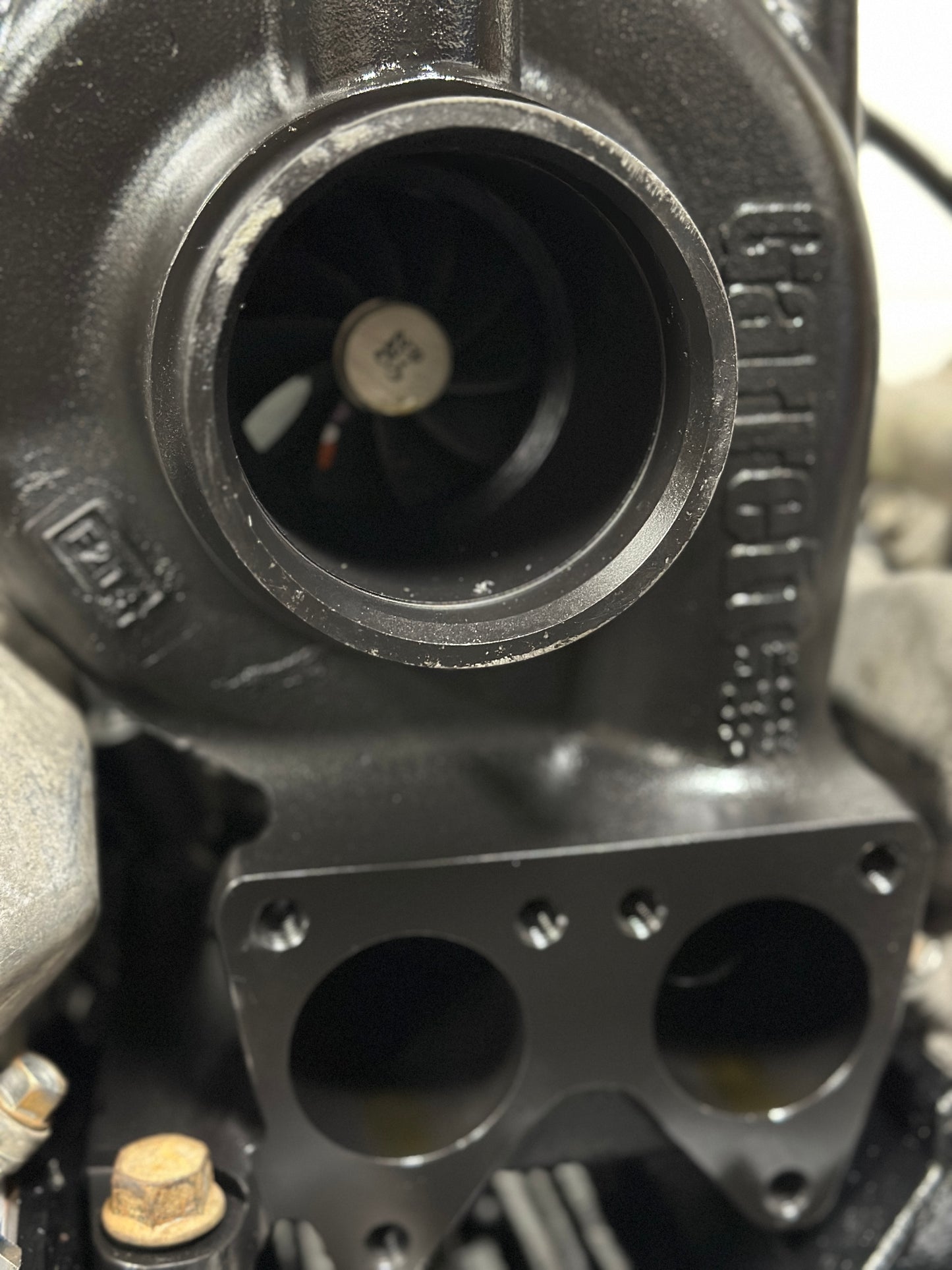 JZM 63.5mm LLY-LML VGT turbocharger component by JZ Manufacturing, featuring detailed metal and turbine blade views.